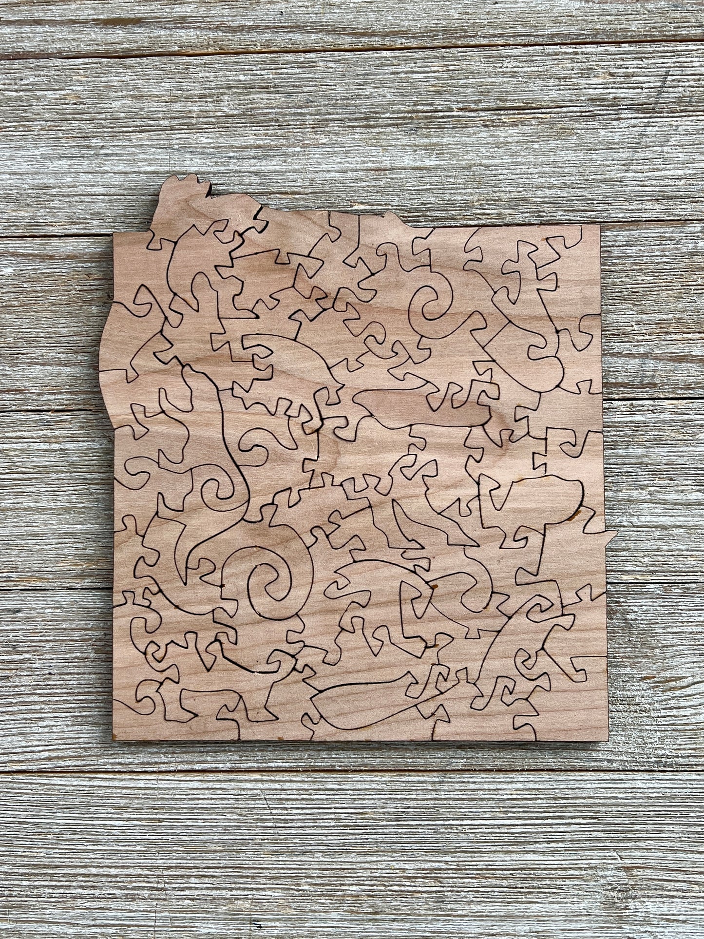 Back Side of River Otter Wooden Jigsaw Puzzle Showing Cut Design