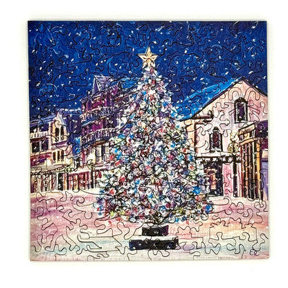 Completed Mackinac Christmas Tree wooden Christmas puzzle showing a festive winter scene on Mackinac Island.