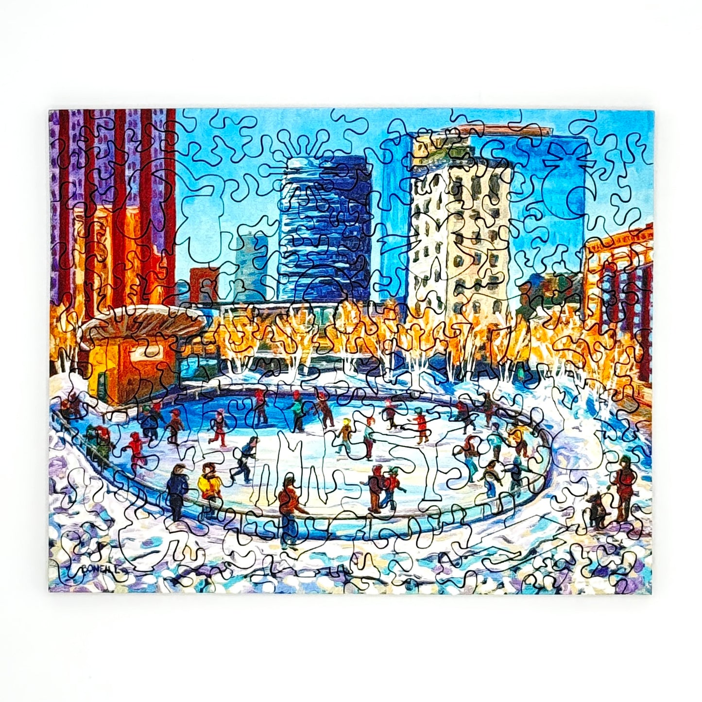 Completed Downtown Ice Skating winter scene puzzle showing skaters in a snowy city rink.